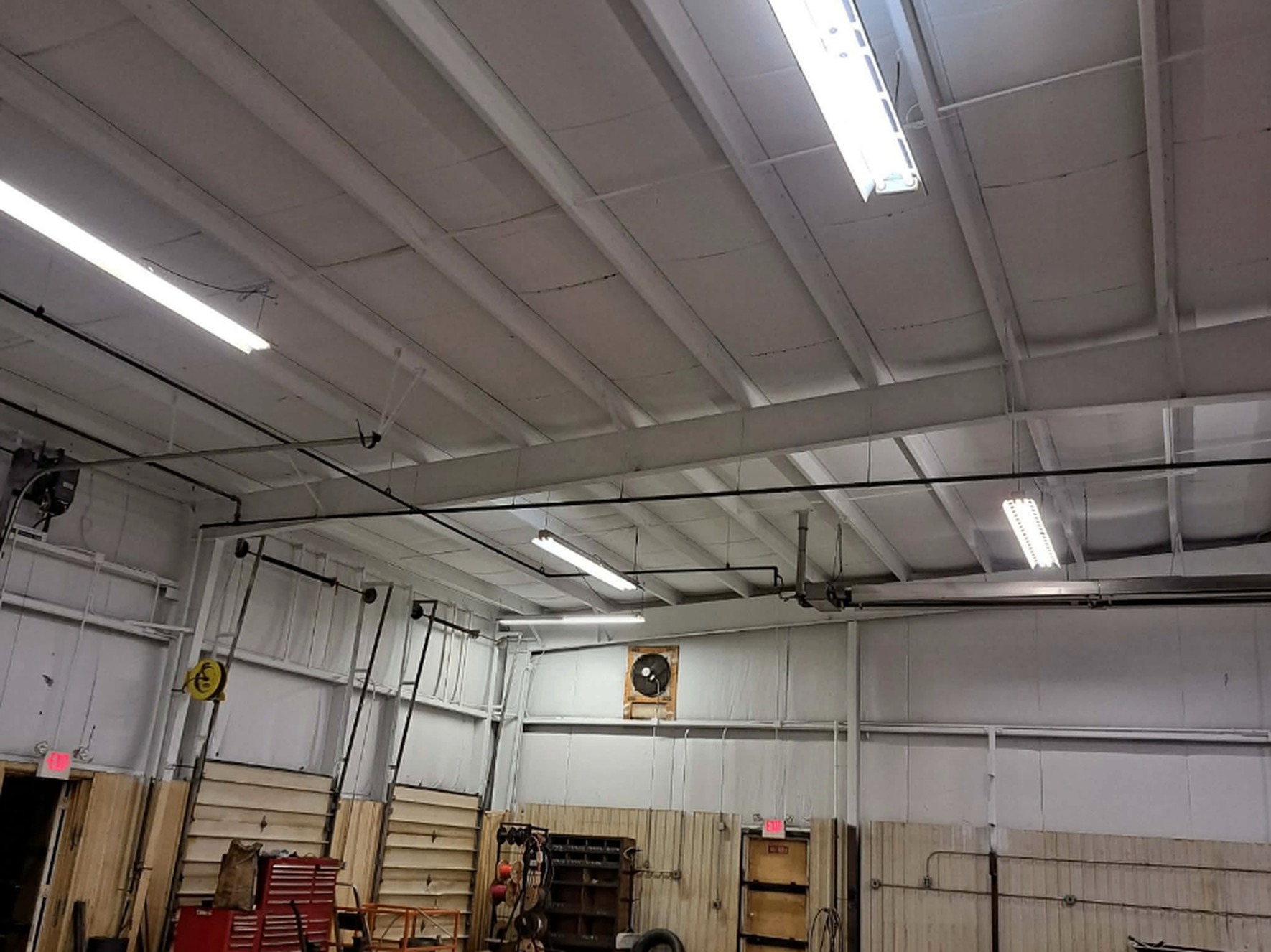 Same shop ceiling and steel sprayed bright white with dry fall
