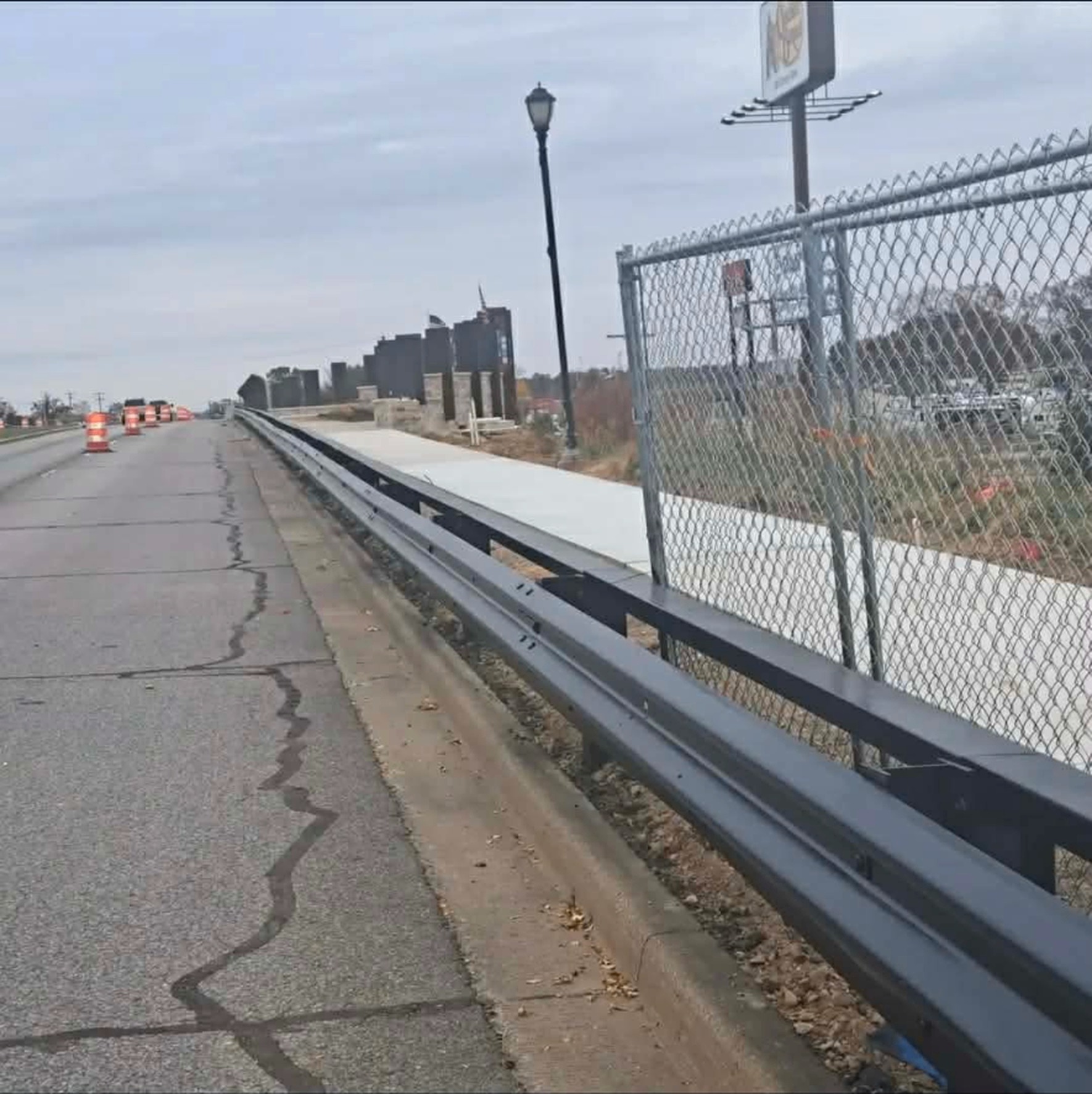 Cassopolis Street bridge guard rail finished in a deep even coat